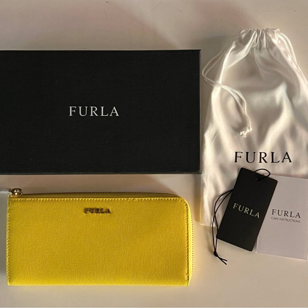 Brand new with tags Furla extra large zip around wallet in sunny yellow leather